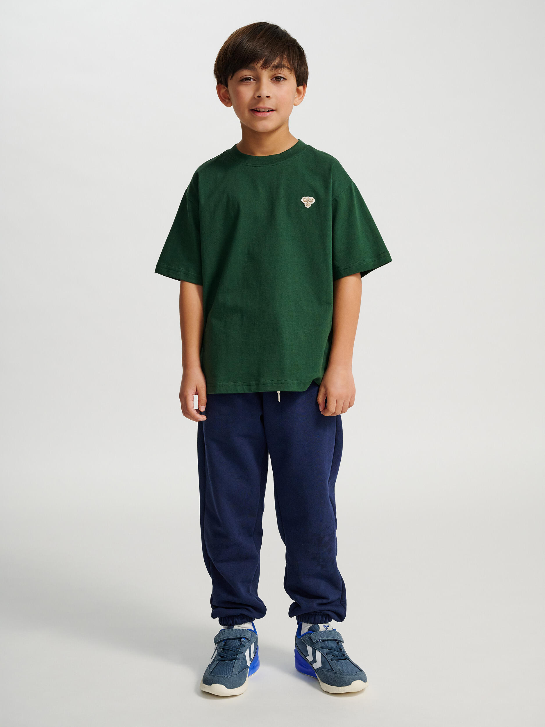 Camiseta Hmljr Loose Los Niños Unisex 4/7