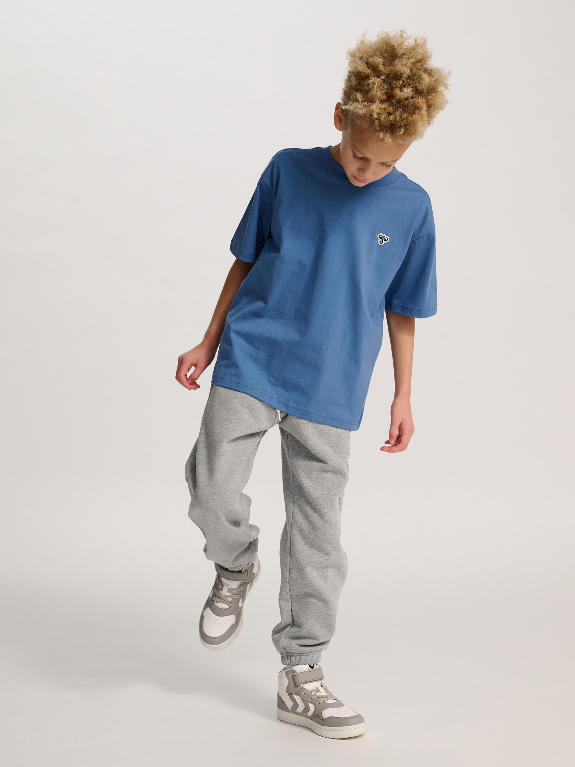 Camiseta Hmljr Loose Los Niños Unisex 4/7