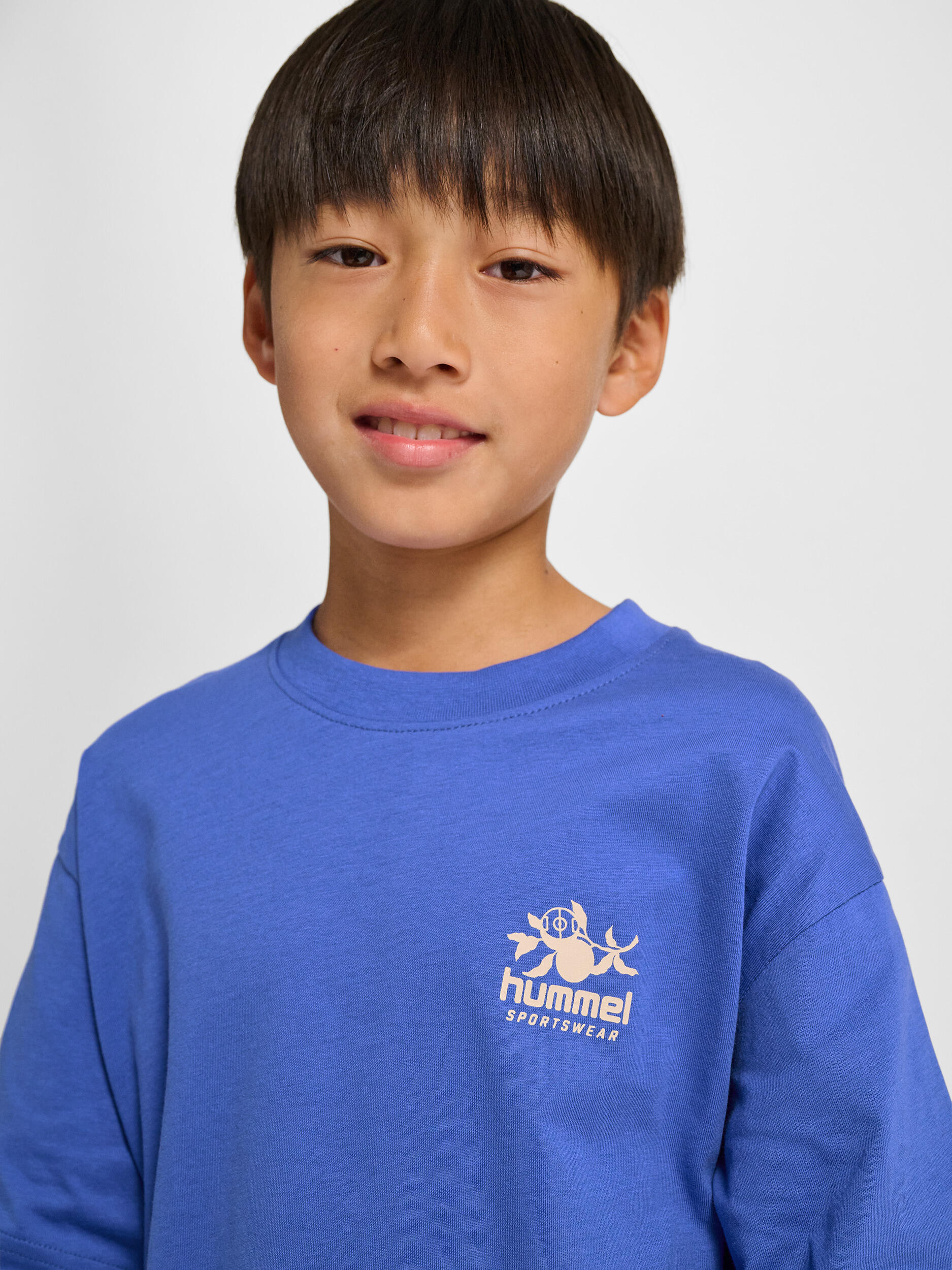 Camiseta Hmljr Loose Los Niños Unisex 4/7