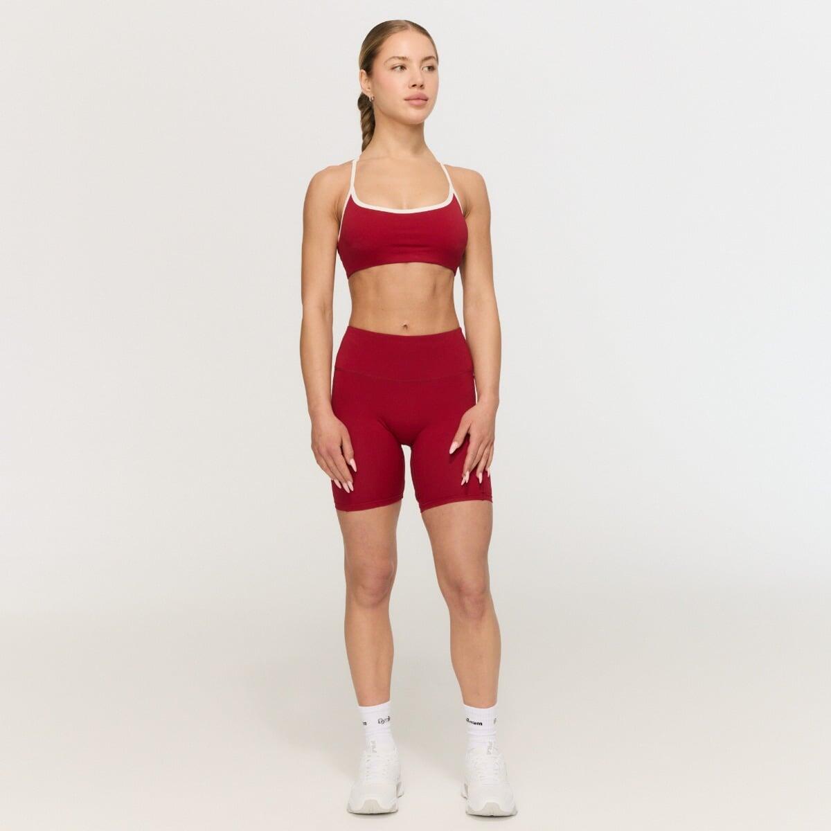 Szorty damskie fitness slim z wysokim stanem czerwone Varsity 3/4