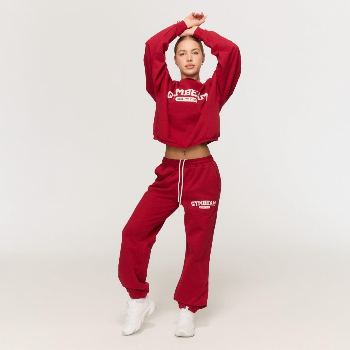Spodnie dresowe damskie fitness oversize czerwone Varsity 2/4