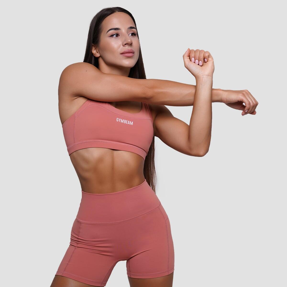 Biustonosz sportowy damski fitness bez zapięcia łososiowy FIT 4/7