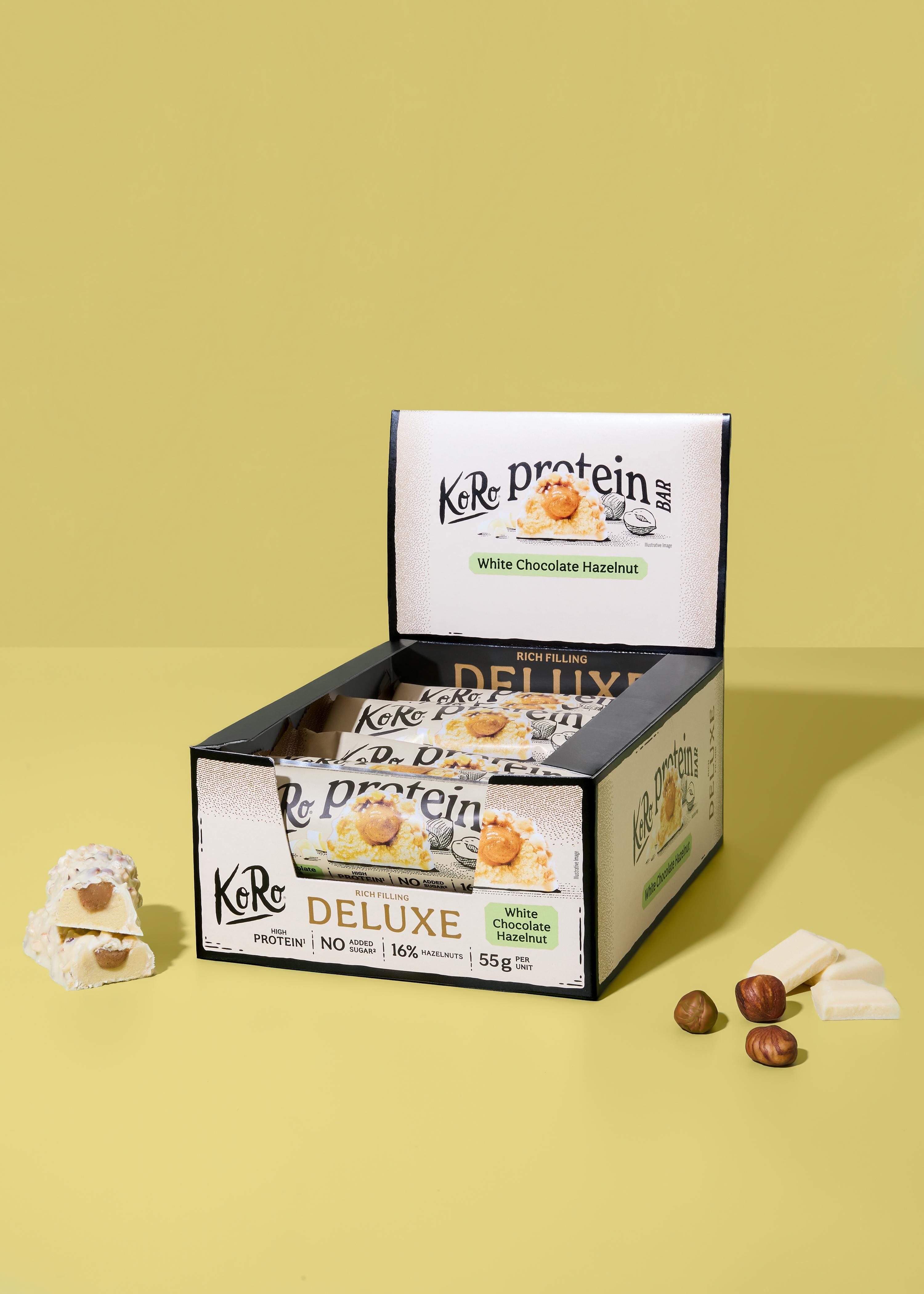 Barretta proteica deluxe con cioccolato bianco e nocciole | 12 x 55 g 2/7