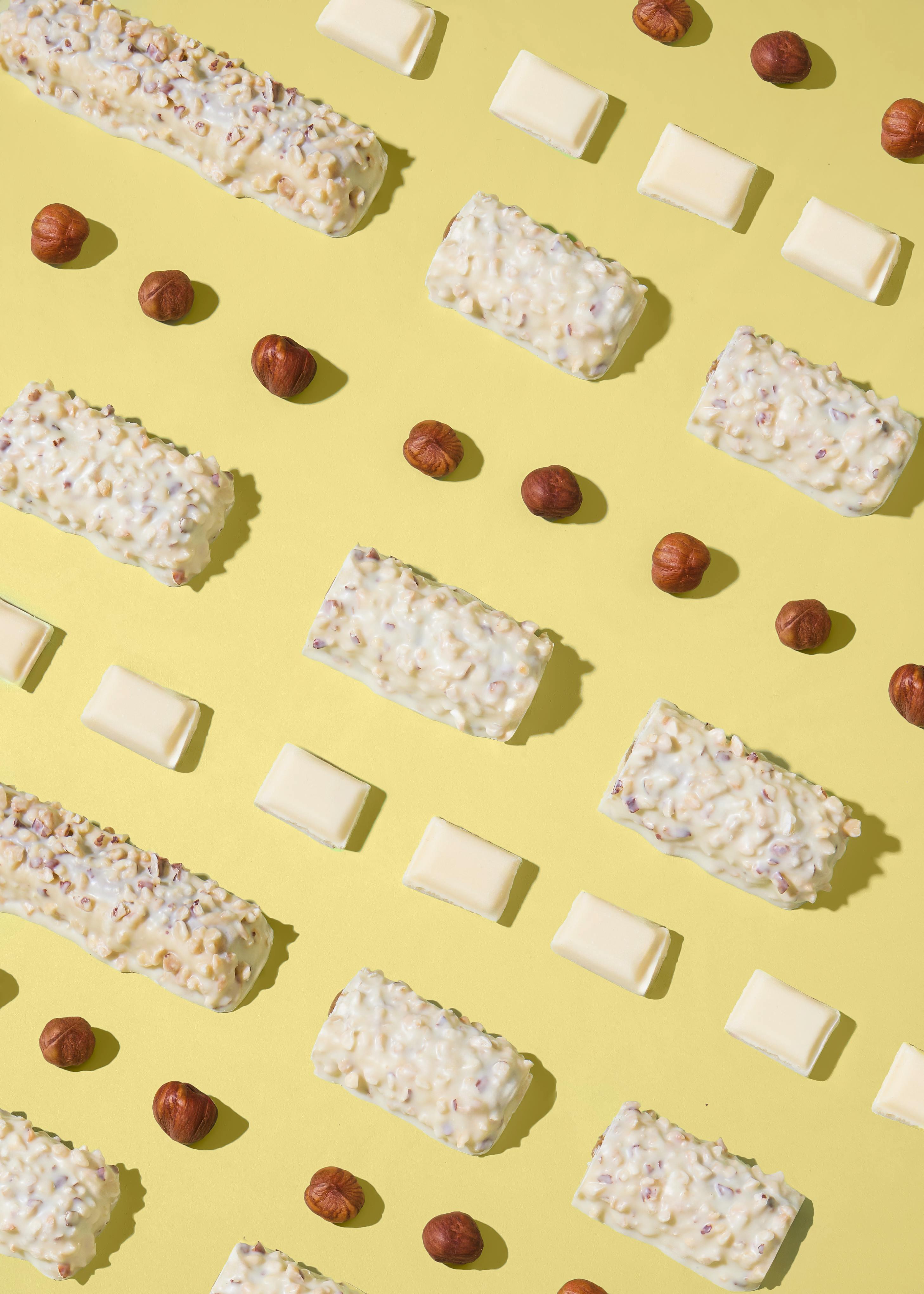 Barretta proteica deluxe con cioccolato bianco e nocciole | 12 x 55 g 5/7