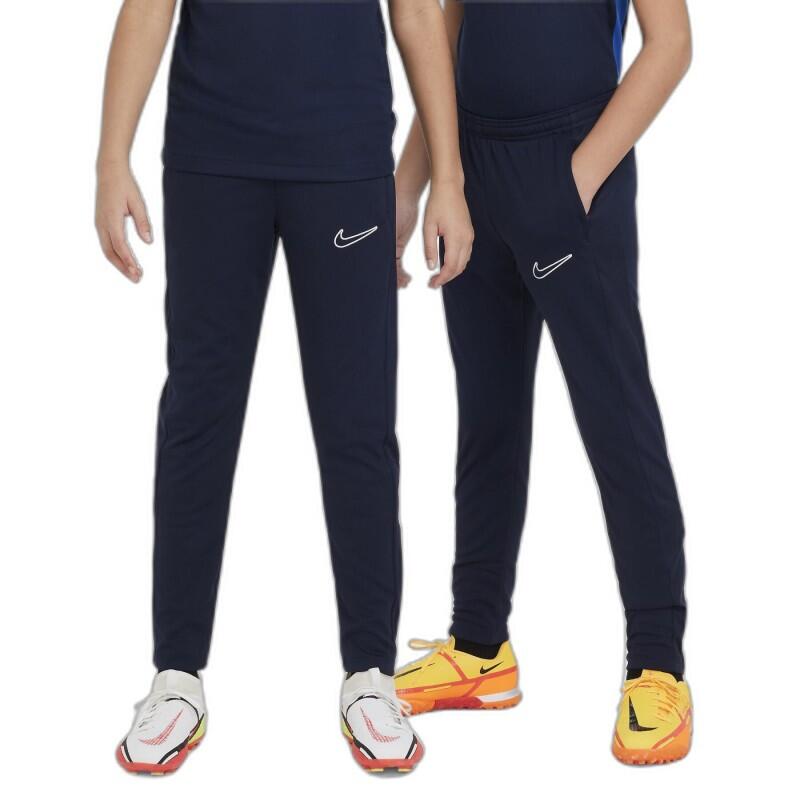 Pantalón Nike entrenamiento niño slim cintura baja azul marino/blanco 4/5