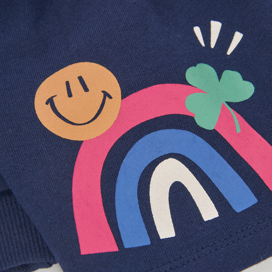 Conjunto punto niña azul marino estampado arcoíris 7/7