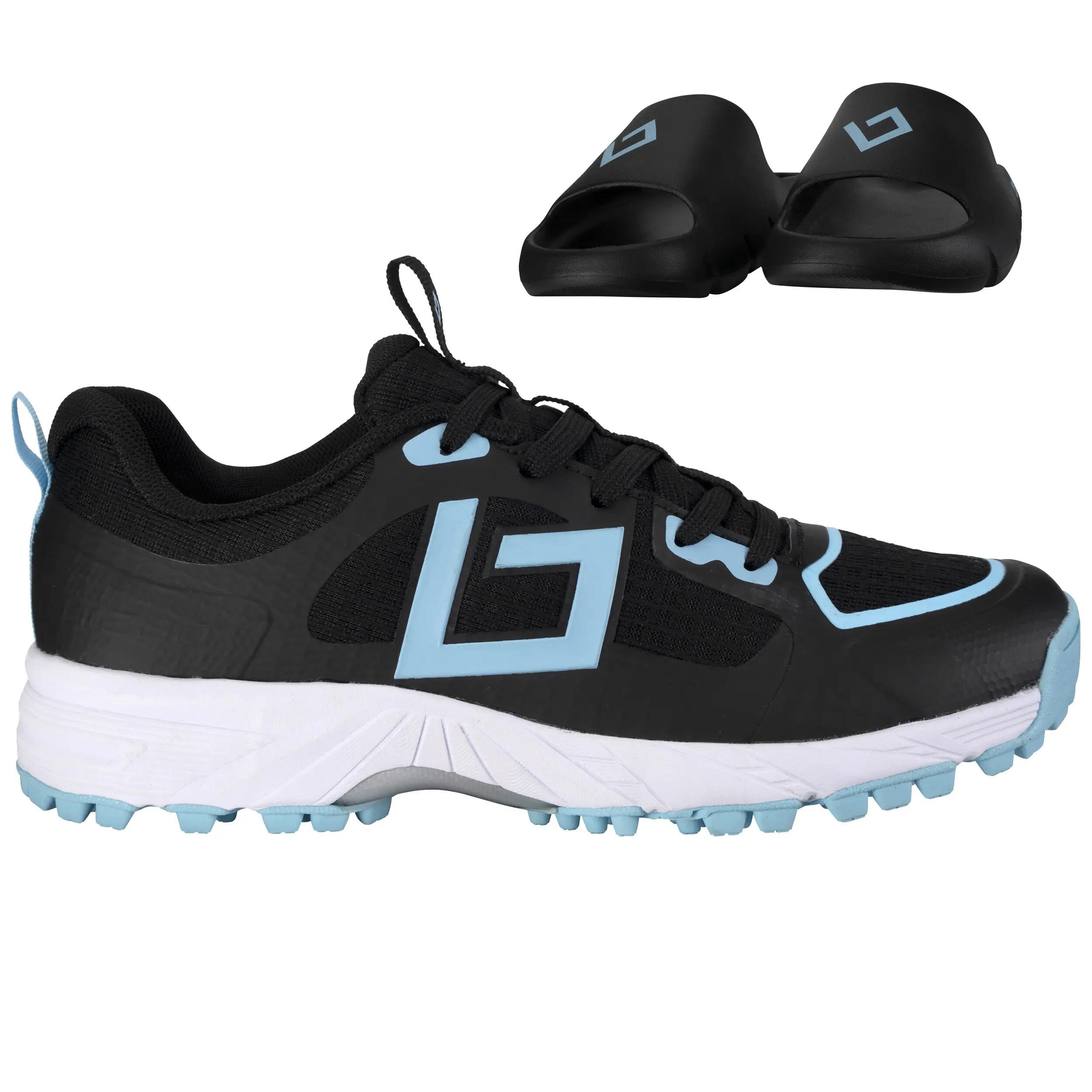 Brabo Tribute Junior Turf Chaussures de hockey Black/Light Blue met Slides 1/1