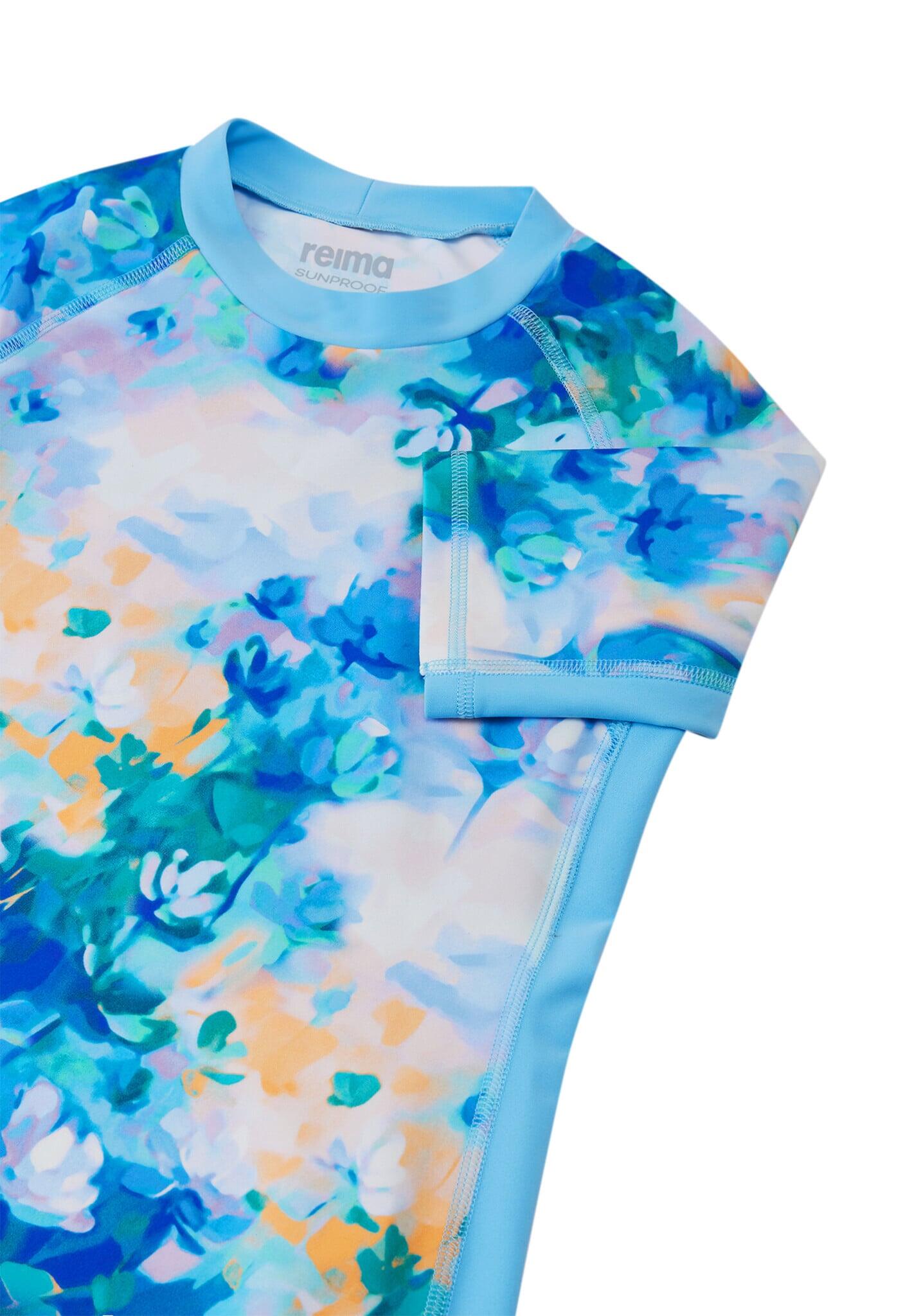 Maglietta con protezione solare per bambina Joonia blu fresco 4/5
