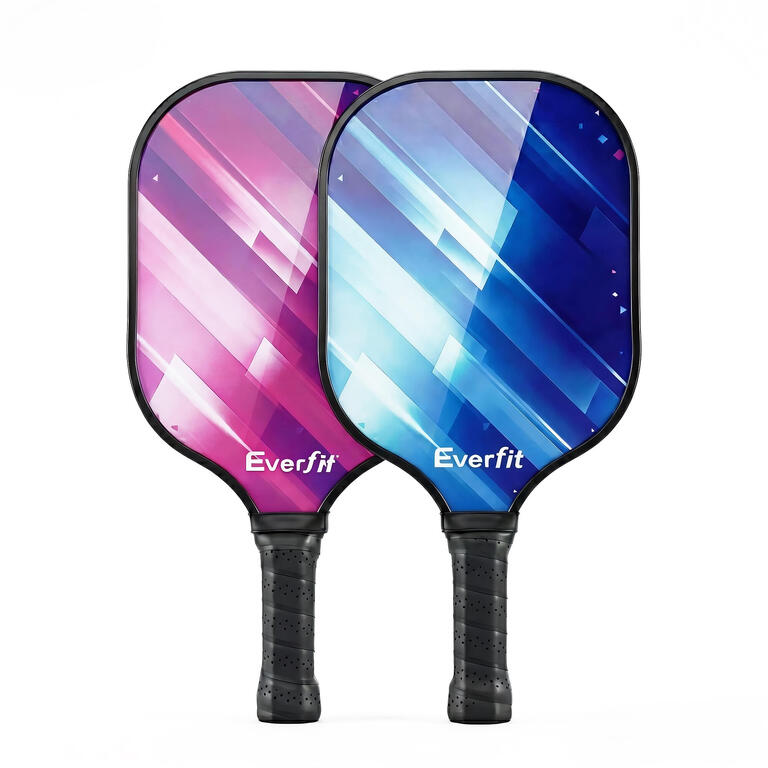 Pair of pickleball paddles with balls and carry bag