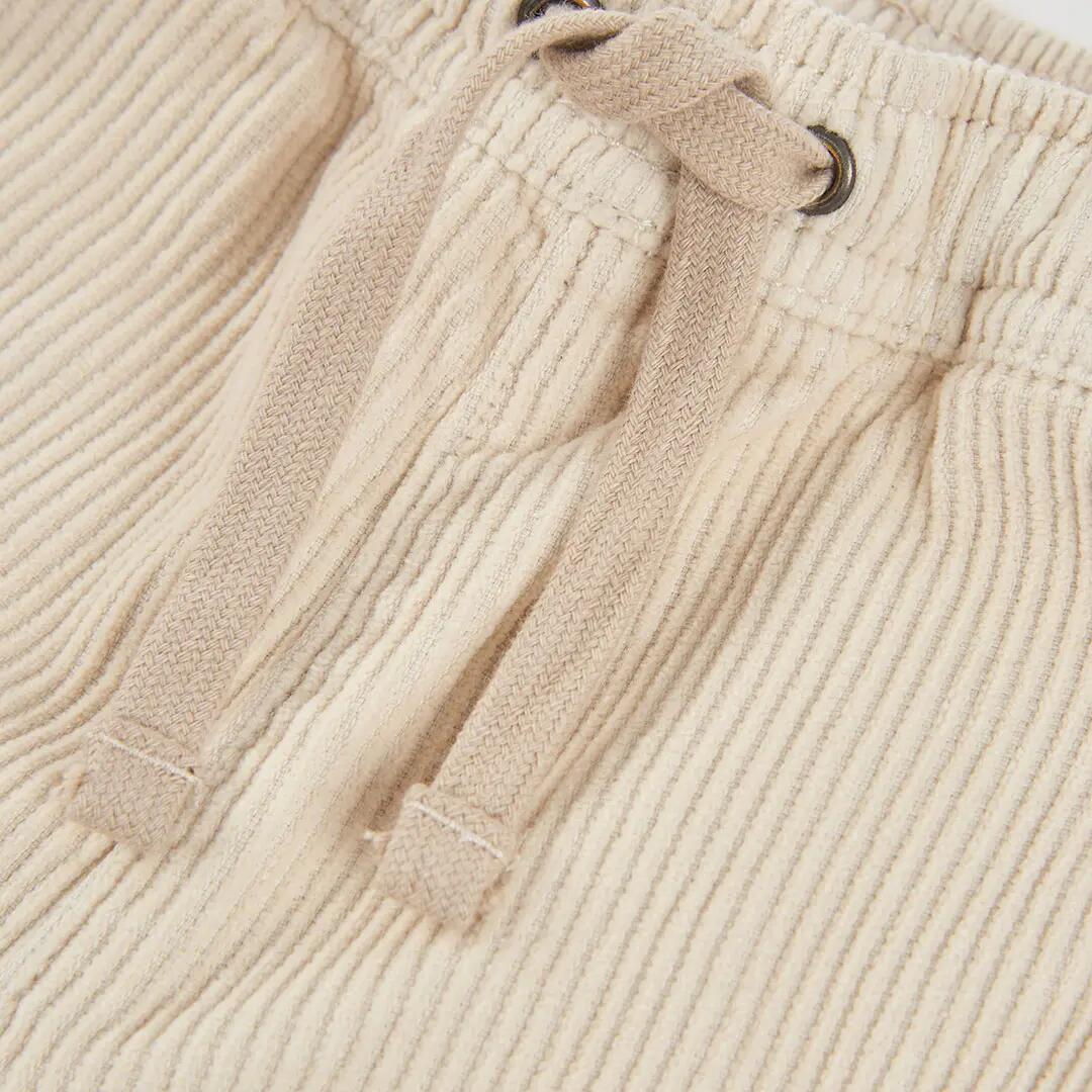 Pantalón pana niño beige con bolsillos 3/4