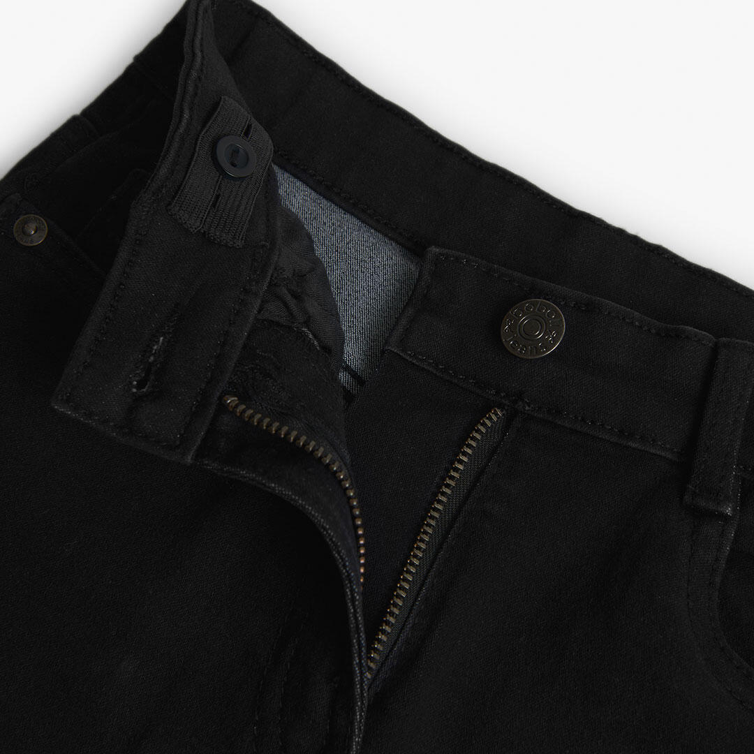 Pantalón vaquero elástico para niña negro 3/4