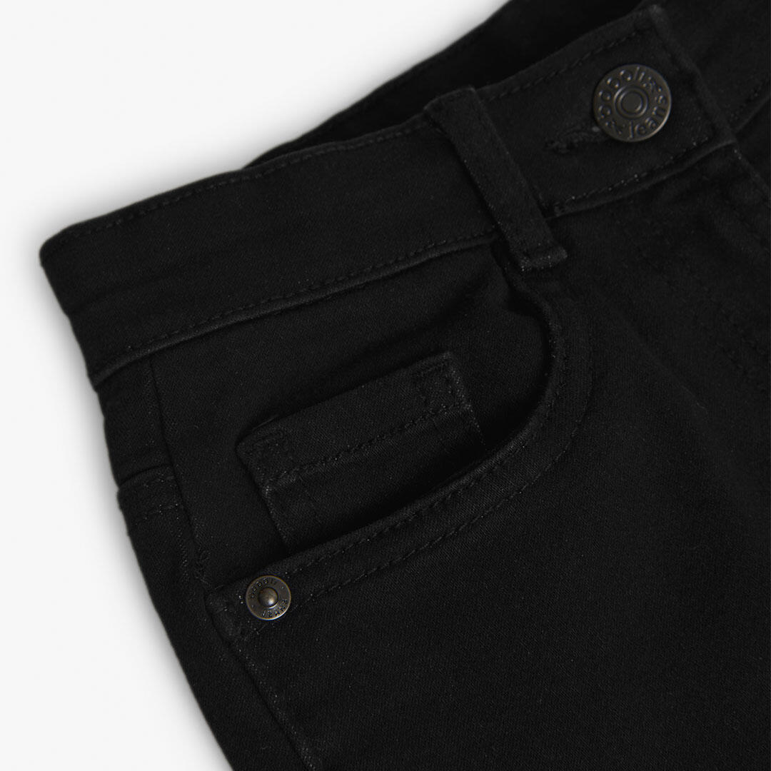 Pantalón vaquero elástico para niña negro 4/4