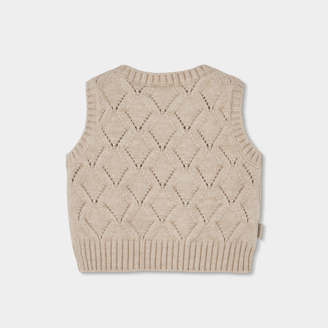 Chaleco beige niña bordado de flores 2/4