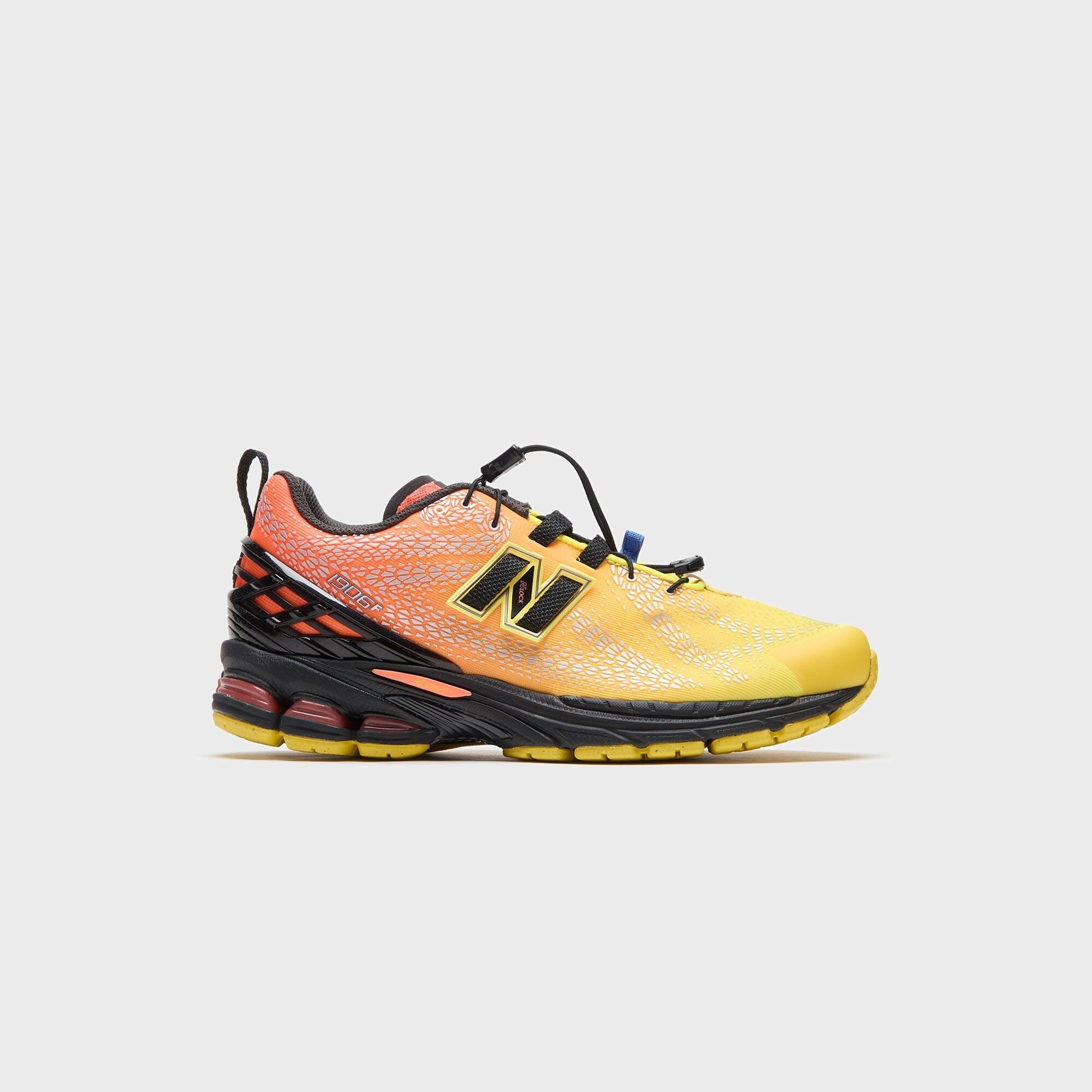 New Balance 1906F Punch Yellow Tangerine Heat Black - Herren Walking-Schuhe 1/2