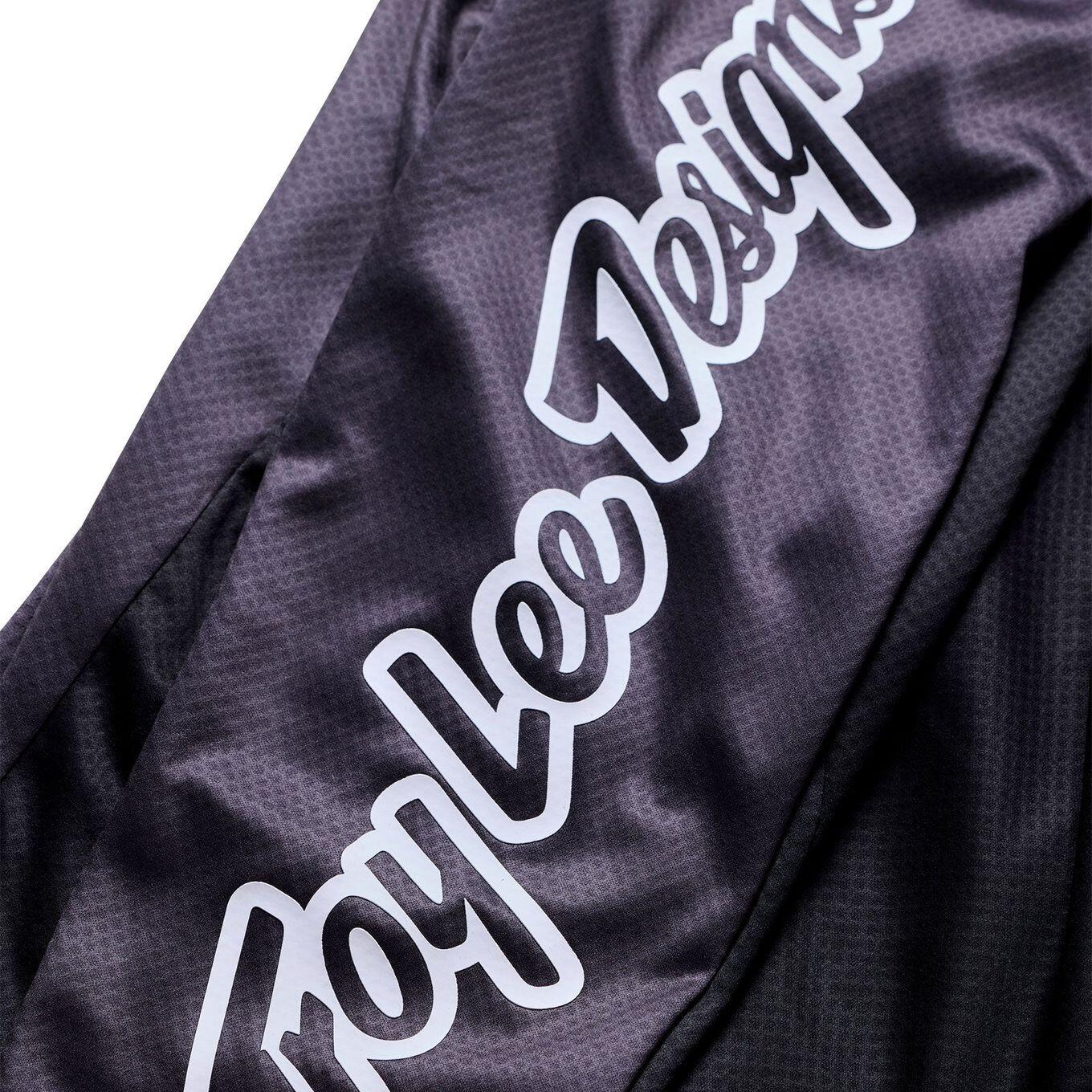 Langarmtrikot von Troy Lee Designs Stage in Schwarz/Violett 6/7