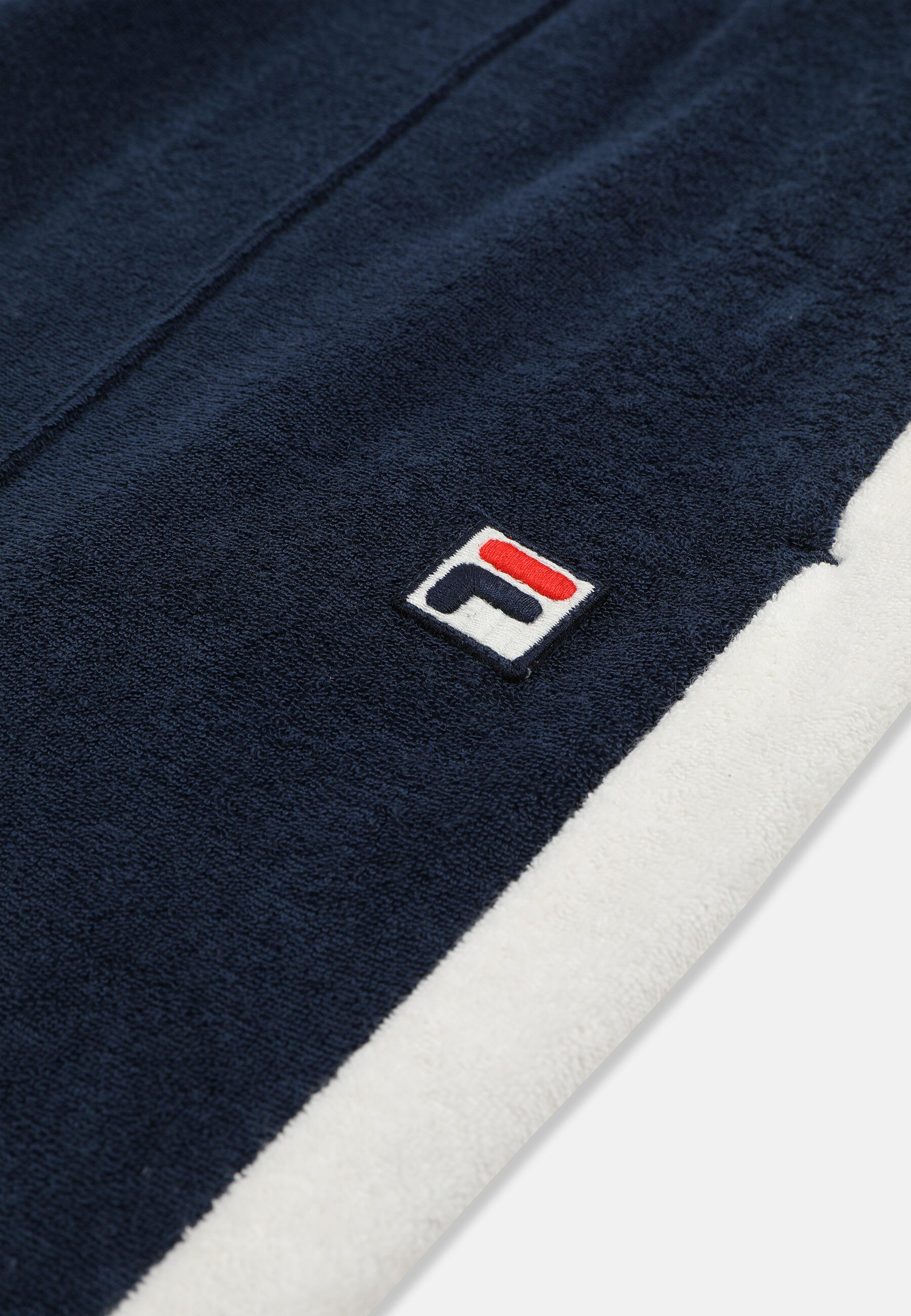 FILA Apparel ADRIANO pantalon de survêtement slim en tissu éponge à empiècements 3/3