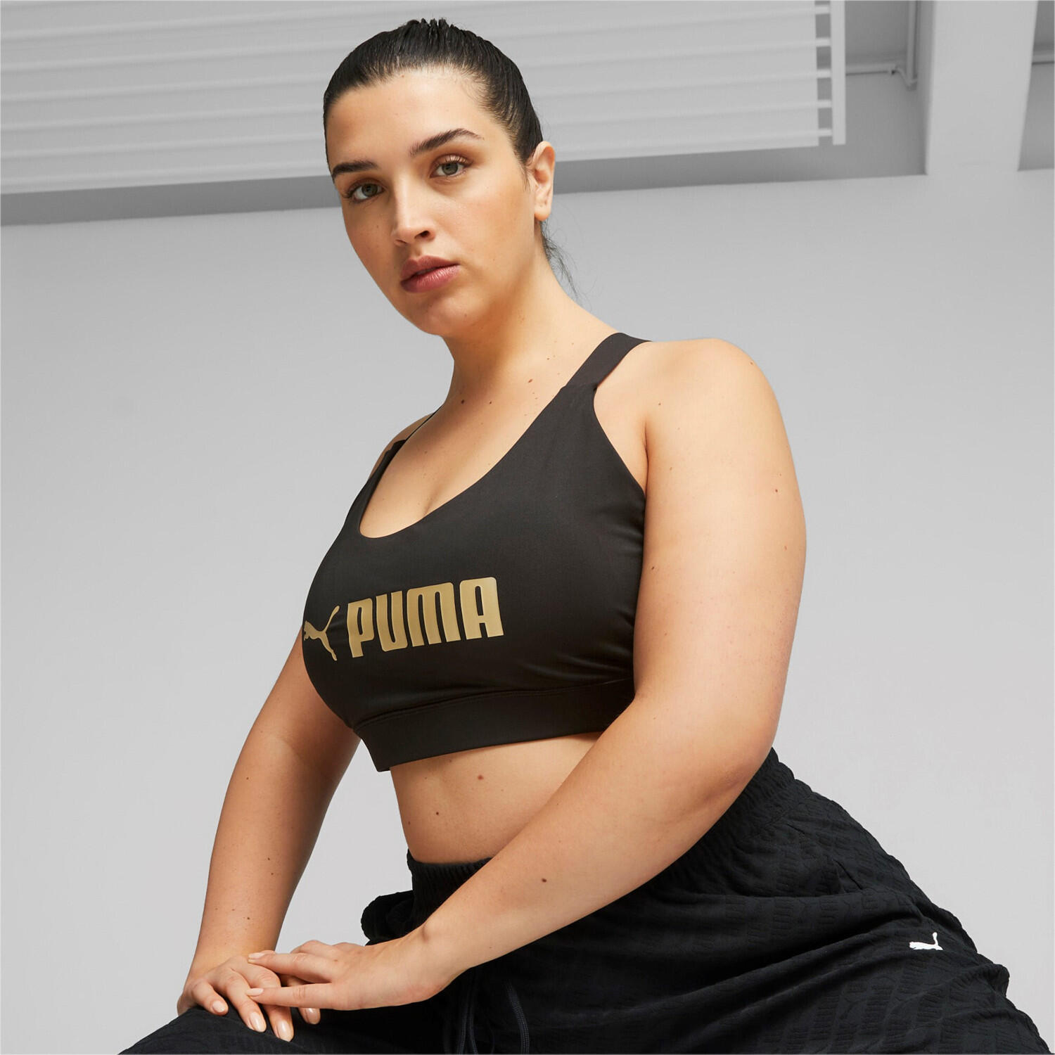 PUMA Fit Mid Support Trainings-BH Damen PUMA Black Gold 8/9