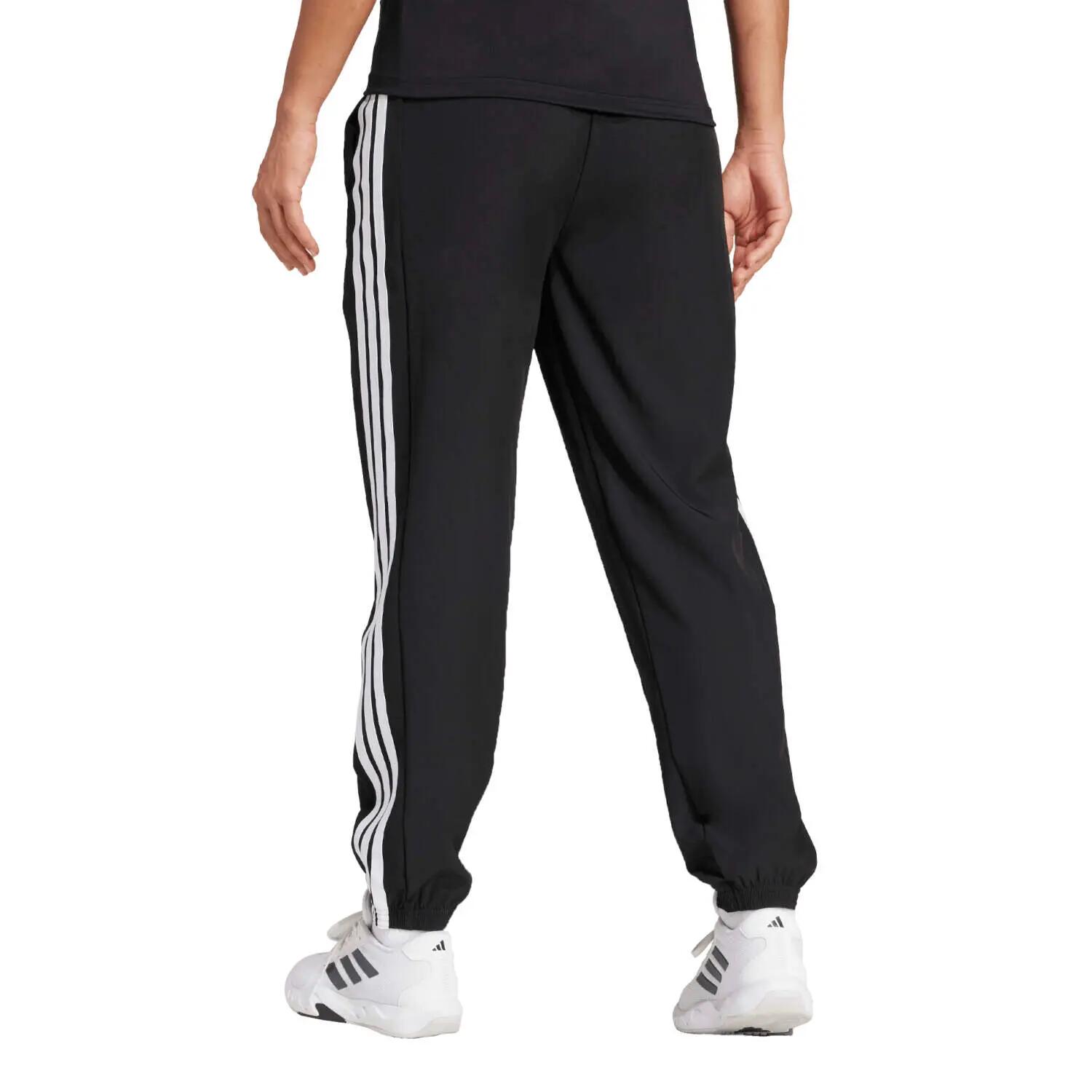 Pantaloni Train Essentials 3-Stripes Woven 8/11