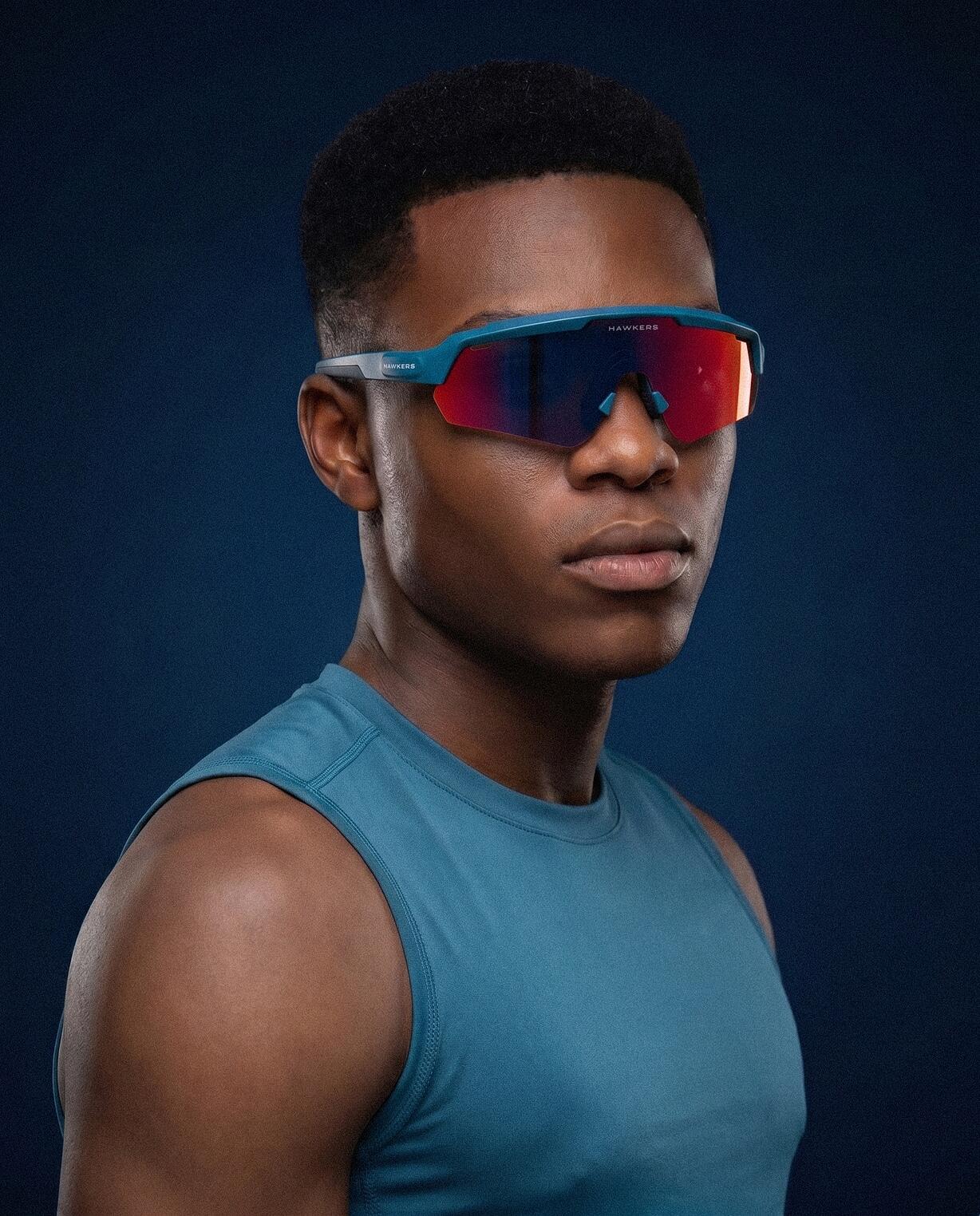 HAWKERS - Gafas de Sol para Hombre y Mujer BLAZE - TEAL RUBY 8/10