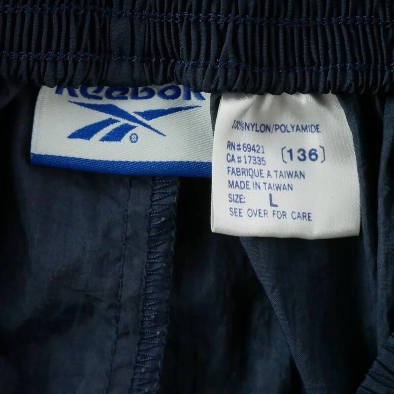Second life - Pantaloni sport femei Reebok vintage albastru închis - Foarte bun