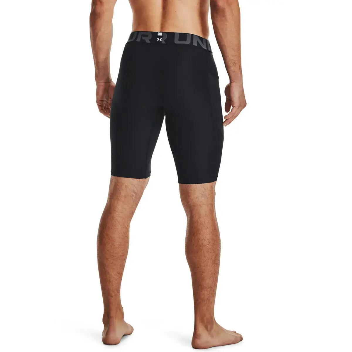 Calções longo Under Armour com bolsos 4/7