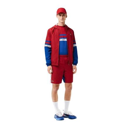 Shorts für , Tennis Herren Orange/Blauer Kapitän
