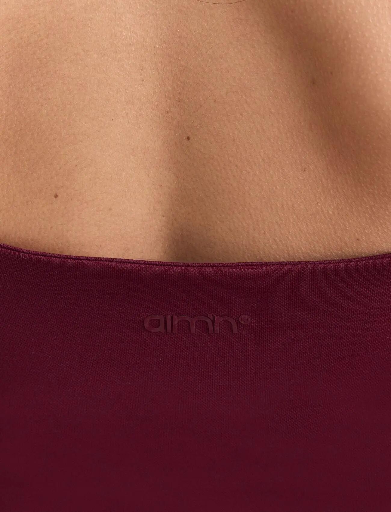 Dames Sportsinglet Naadloos Vormend Met Dunne Bandjes Shape Merlotrood 4/5