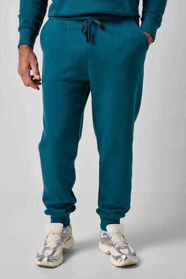Hommes Pantalon en molleton avec cordon coulissant sous tunnel coupe Modern Fit