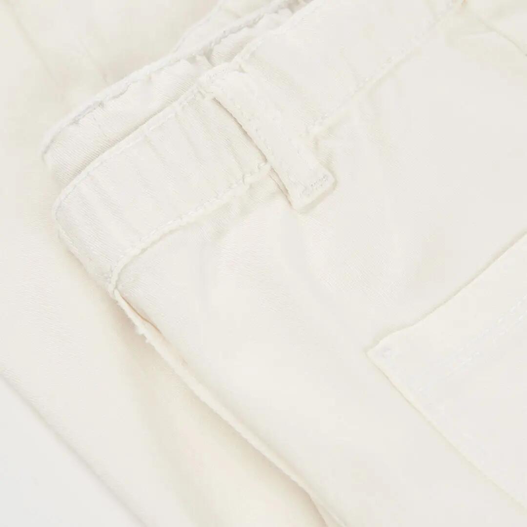 Pantalón de sarga elástica para niña de corte ancho blanco 4/4