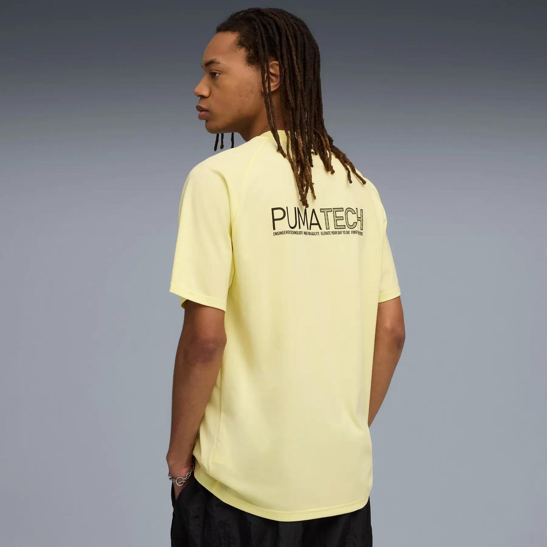 Puma PUMATECH GRAPHIC RELAXED heren T-shirt geel maat L 6/7