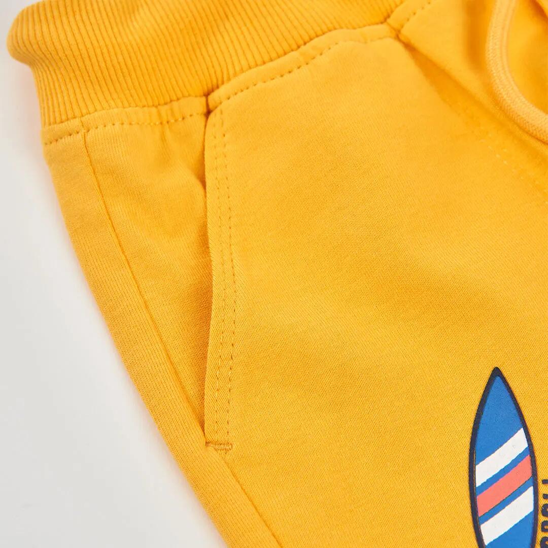 Bermudas de punto para niño con estampado surf amarillas 3/4