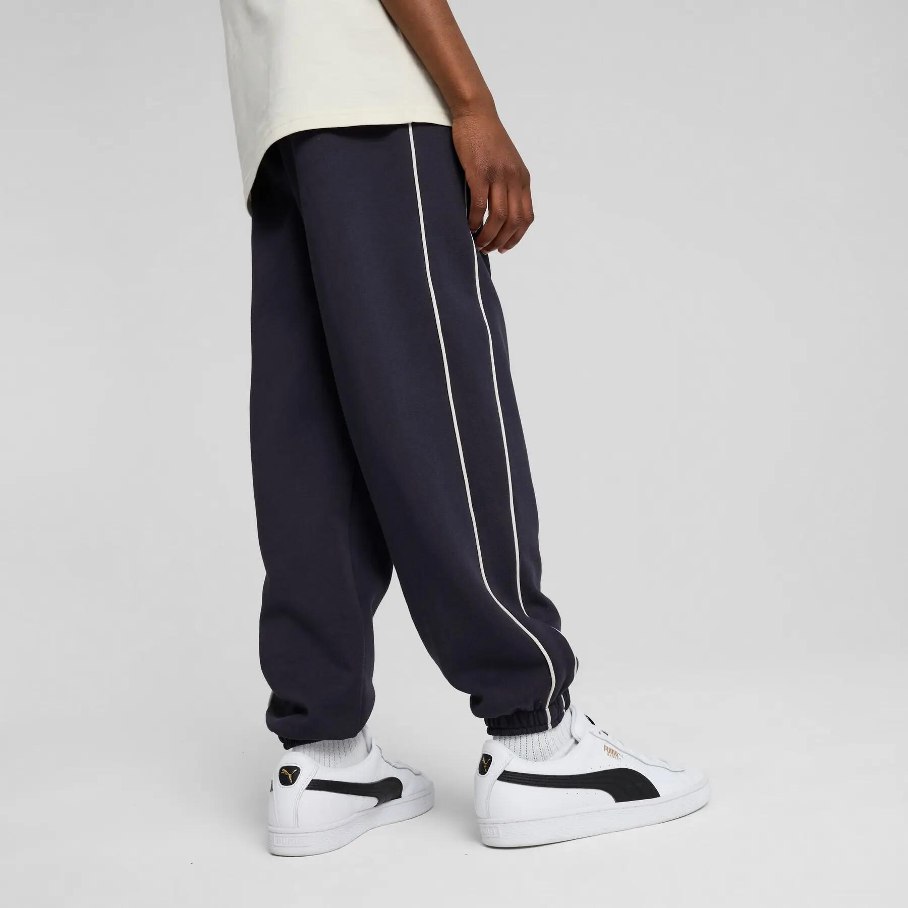 Pantaloni della tuta da ragazzo Puma T7 SUPER PUMA TR blu navy 62986816 taglia 1 4/5