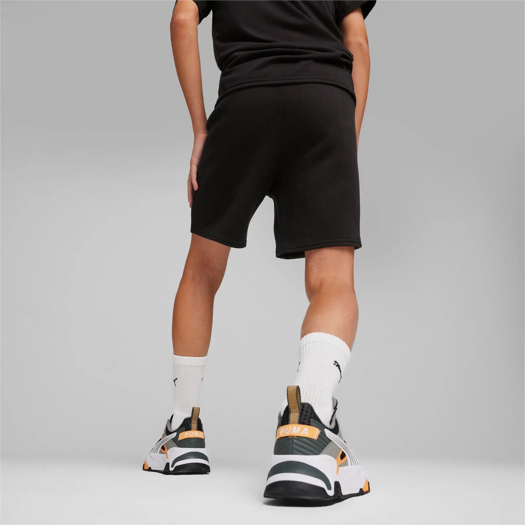 Pantaloncini da ragazzo Puma EVOSTRIPE 8 DK neri 67919701 taglia 164 6/8