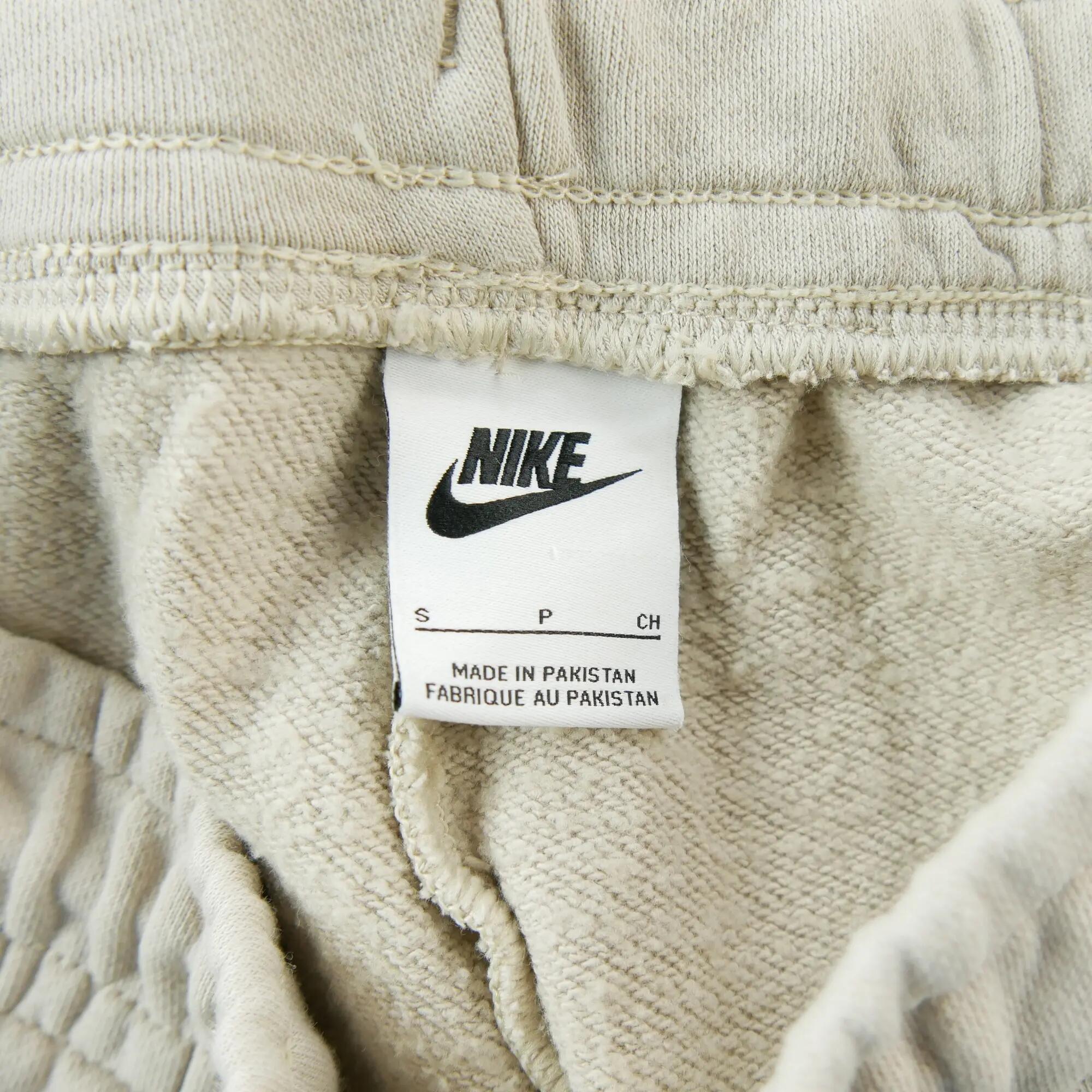 Second life - Damskie spodnie dresowe Nike do treningu cardio beige - Jak nowy 5/5
