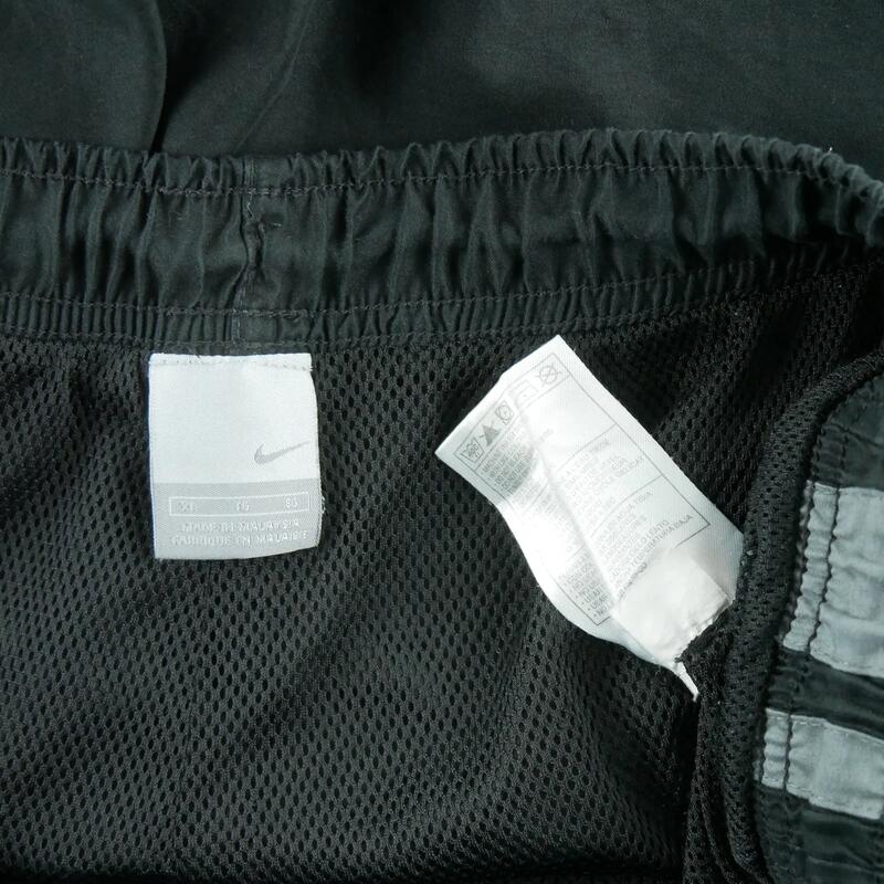 Second life - Nike Joggings bărbați nylon cargo - Foarte bun
