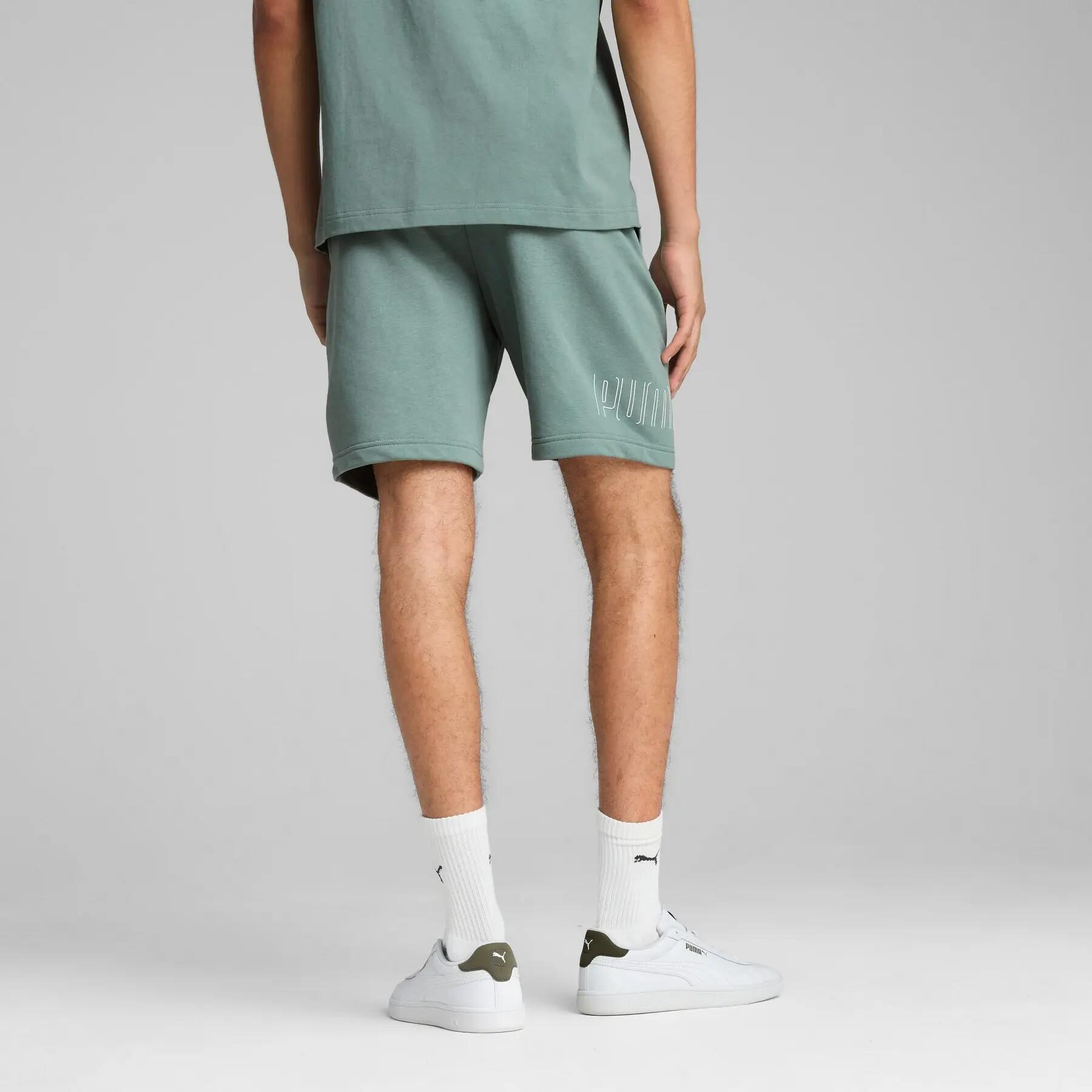 Puma SPORT GRAPHIC 9" TR herenshorts groen maat M 4/5