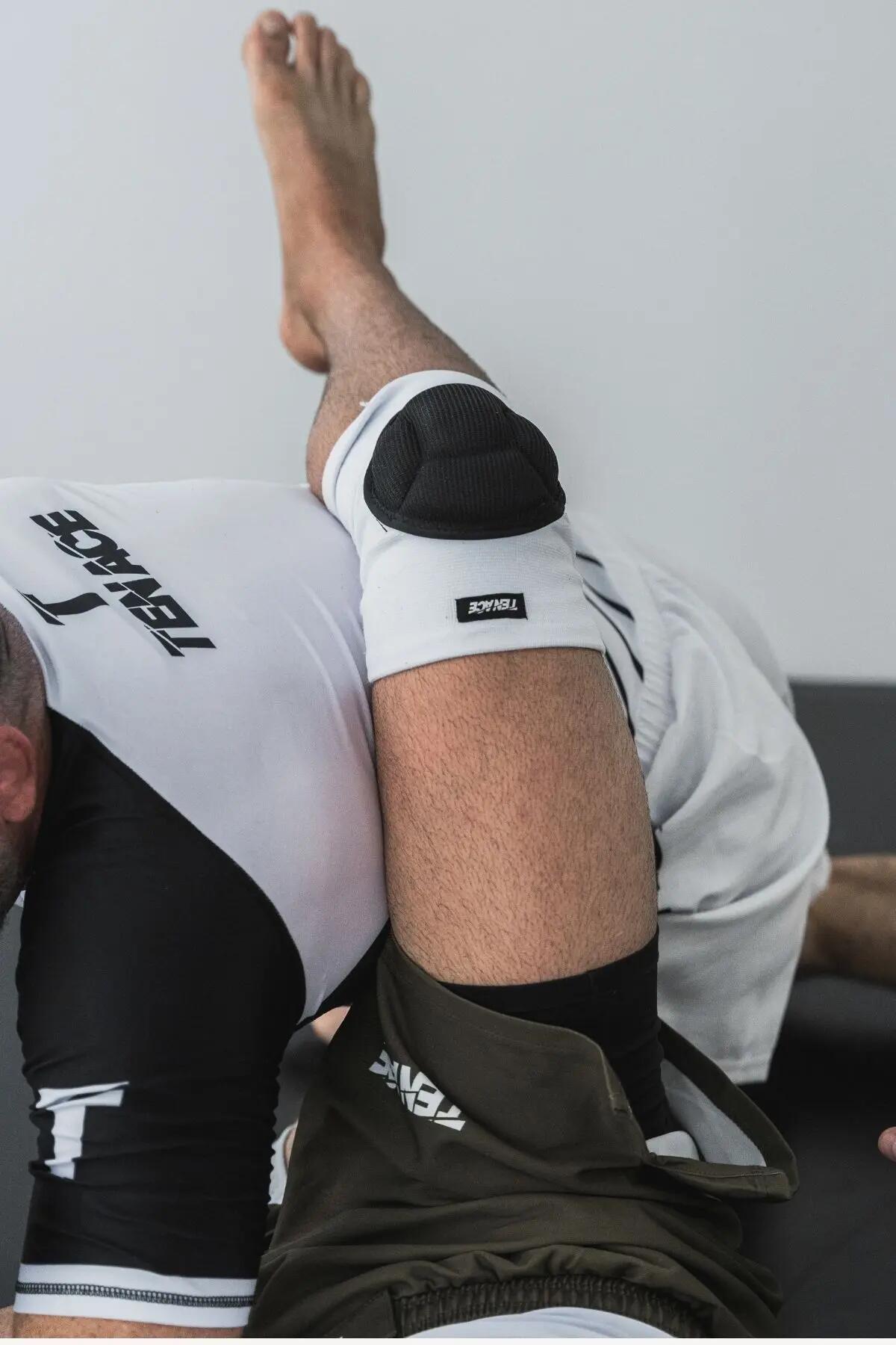 Genouillère Tenace Impact - Blanches rembourrées pour MMA, lutte, wrestling 5/6