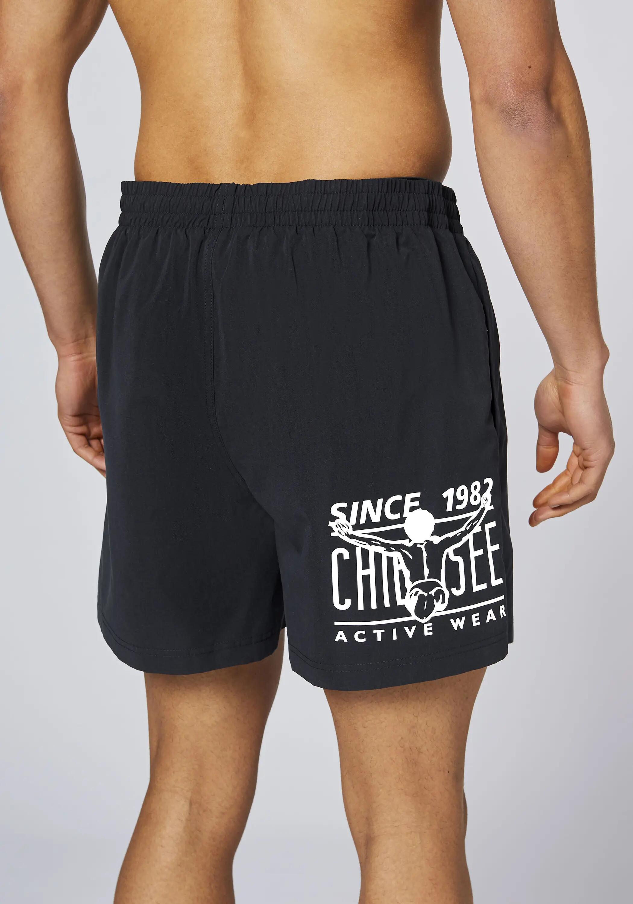 Badehose mit Front- und Rückenprint 8/8