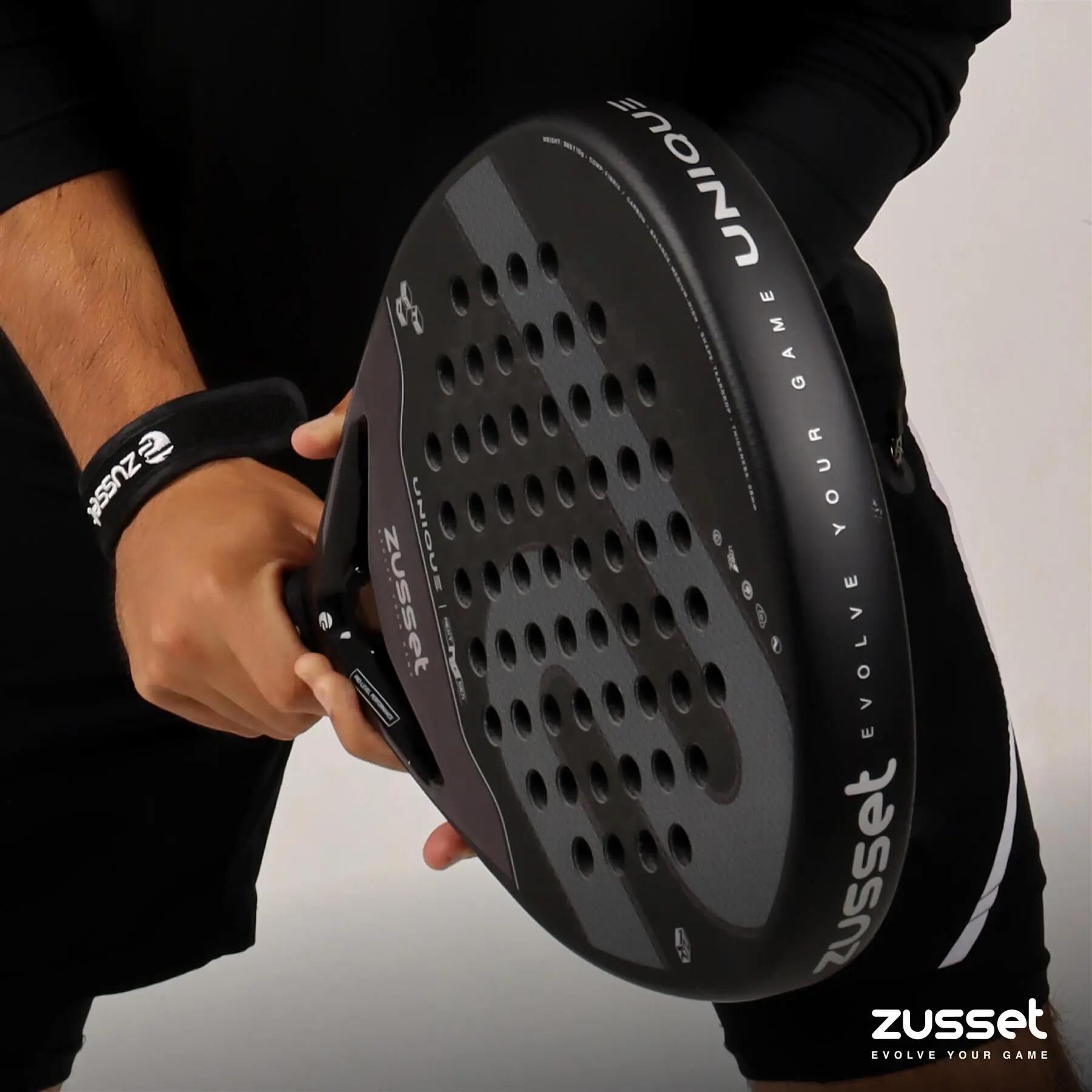 Raquete de padel UNIQUE 12K carbono, formato gota – equilíbrio médio-alto 14/15