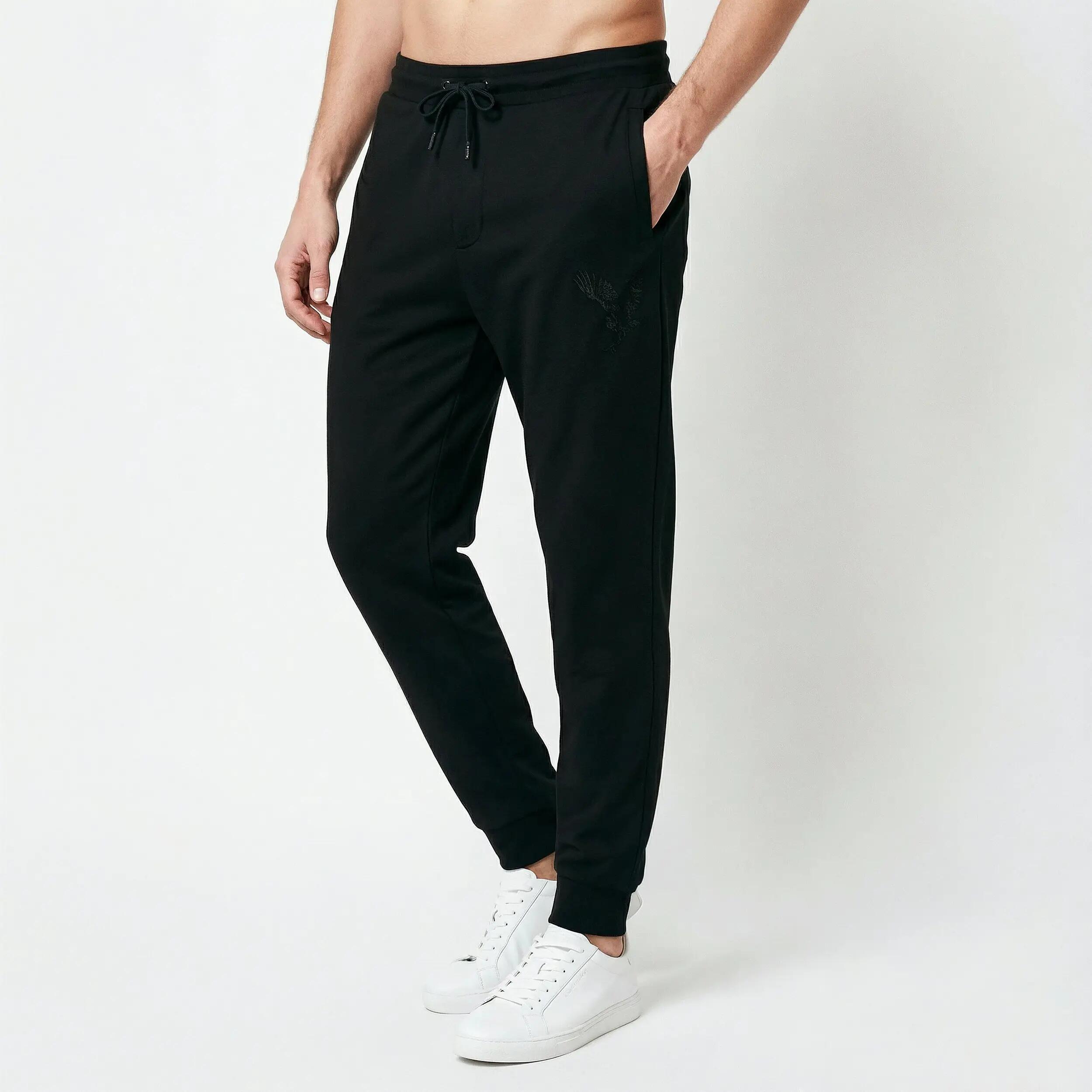 Spodnie sportowe męskie Armani Exchange czarne (6DZPAB-ZJKBZ-1200) L 3/5