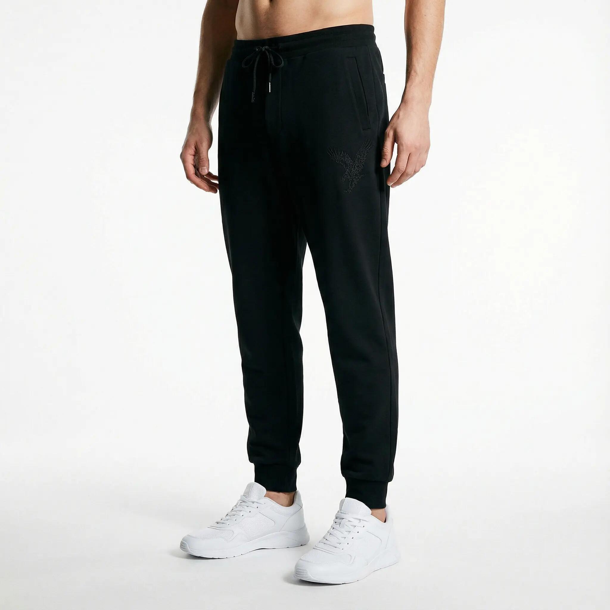 Spodnie sportowe męskie Armani Exchange czarne (6DZPAB-ZJKBZ-1200) L 2/5