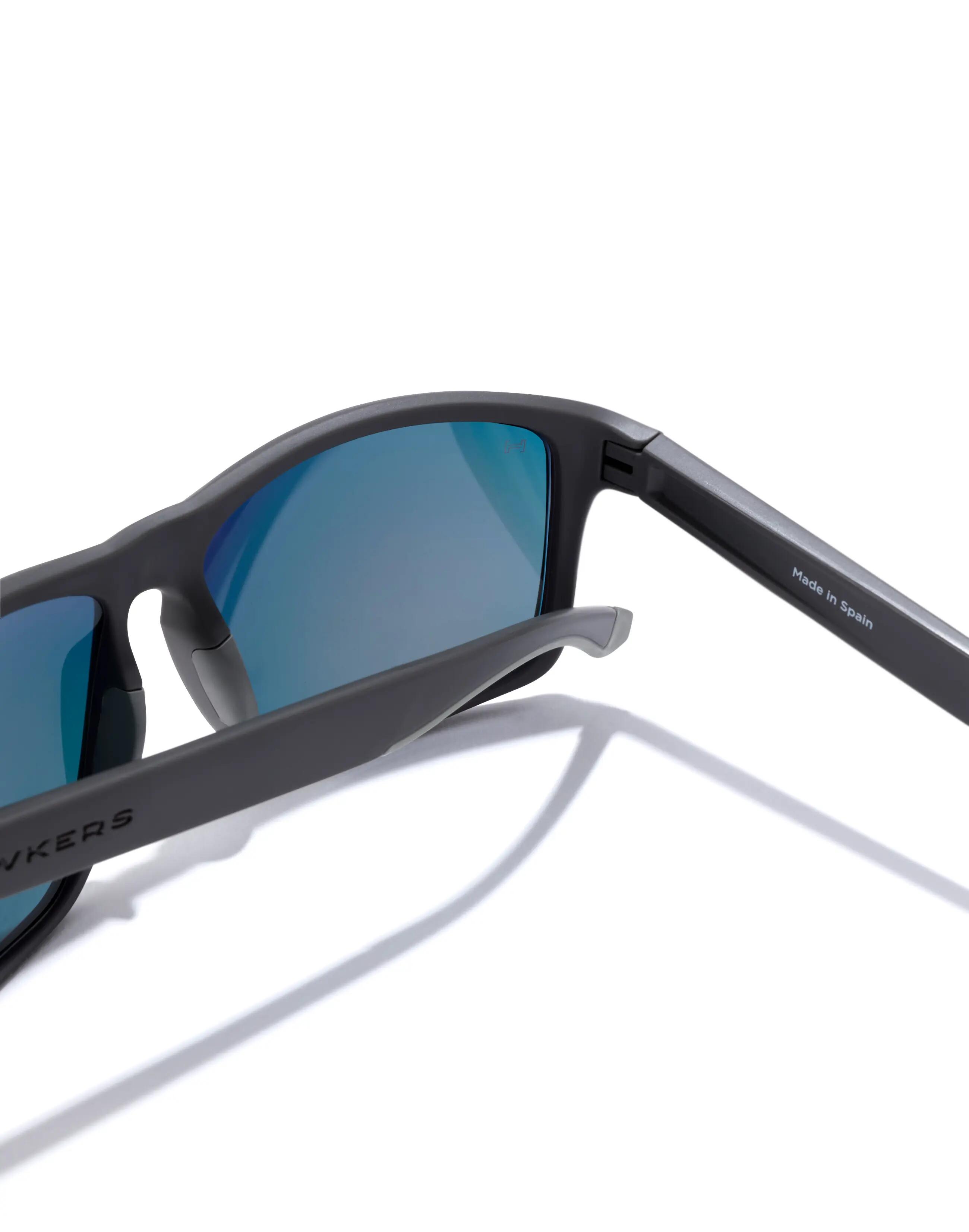 HAWKERS - Óculos de Sol para Homem e Mulher FASTER SPORT RAW - URBAN GREY RUBY 5/6