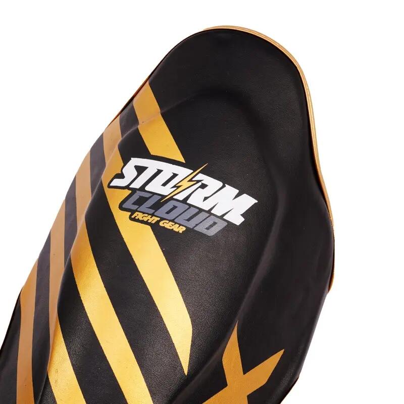 Caneleiras StormCloud Lynx para crianças, pretas e douradas, tamanho Júnior L 7/7