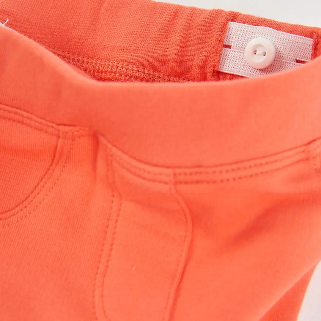Pantalón felpa niña naranja elástico 3/4