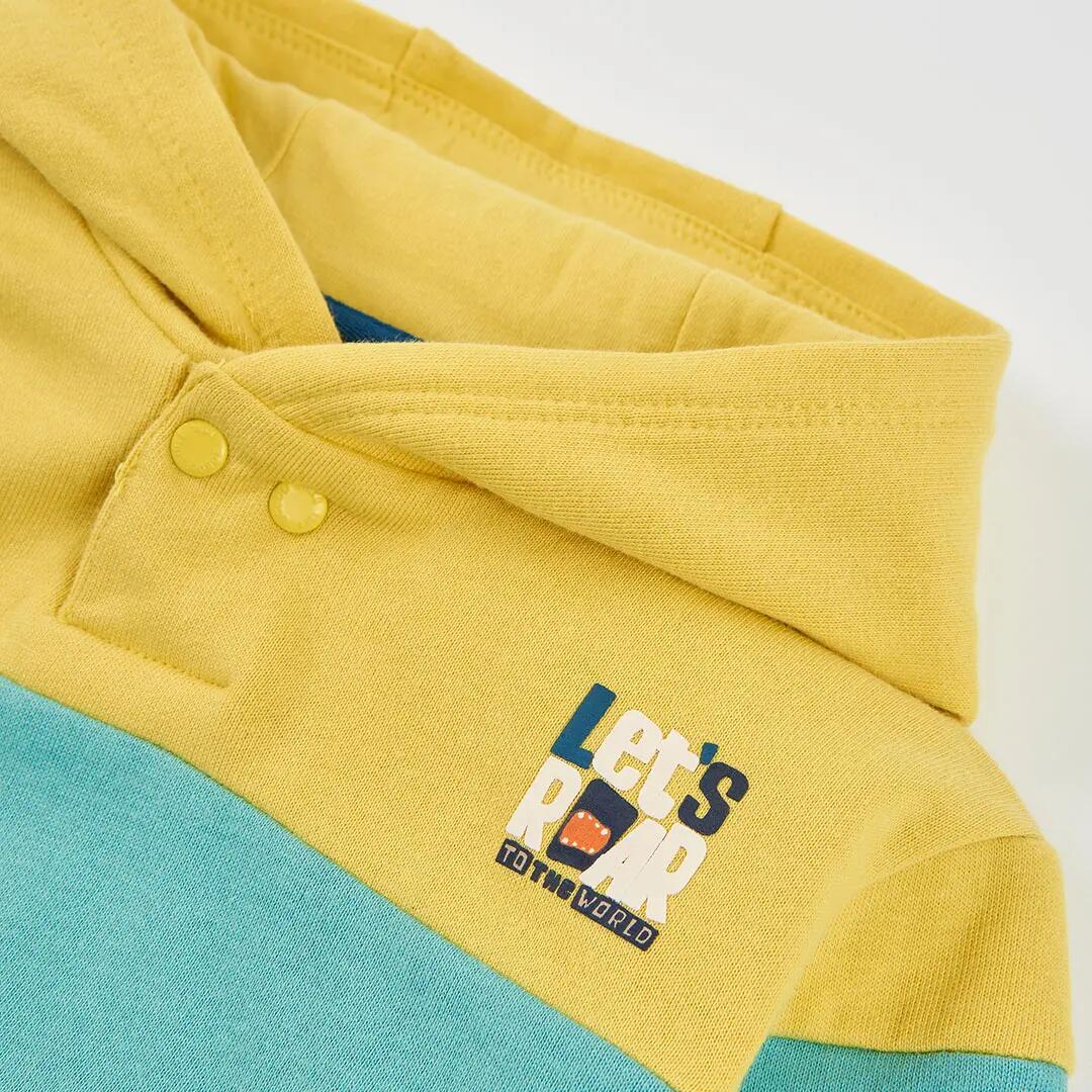 Sudadera felpa niño verde con capucha color block 3/4