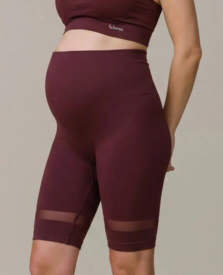 Cycliste de sport et de grossesse Woma