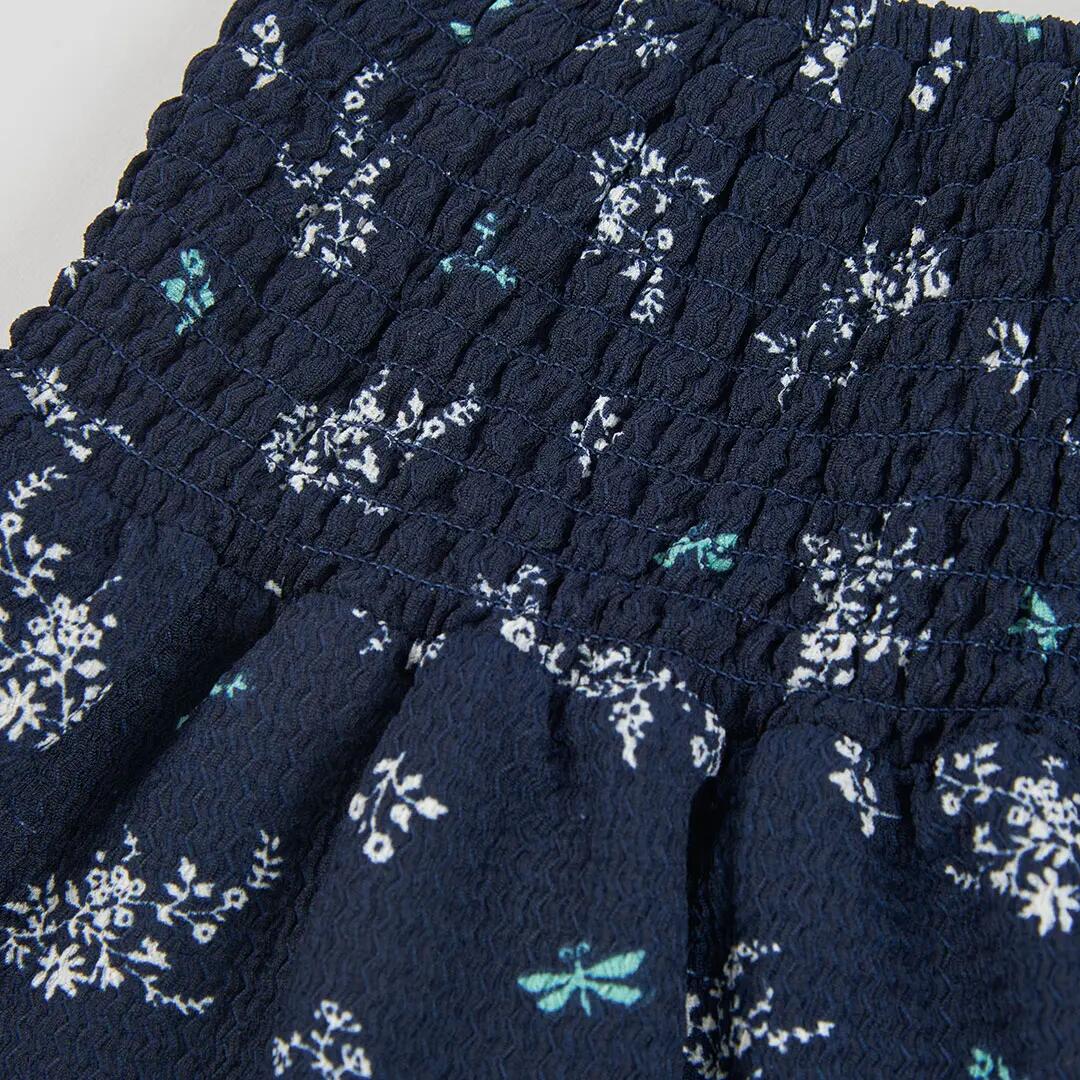 Falda azul marino estampado flores y libélulas 3/4