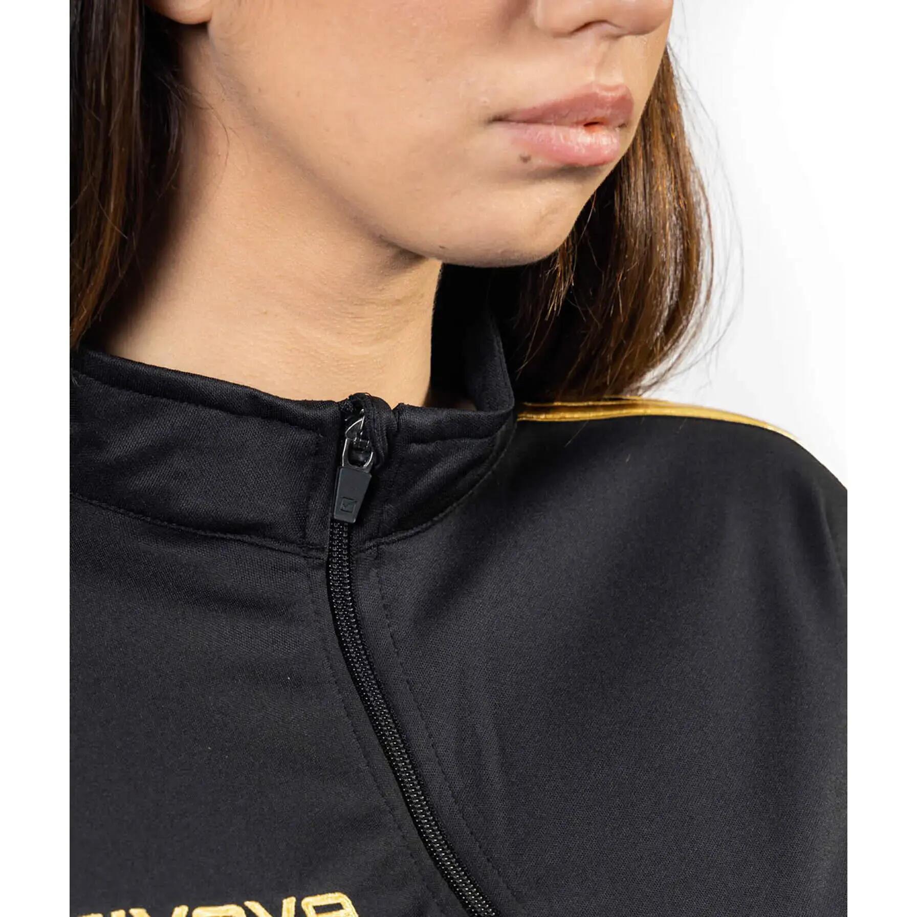 TUTA complete donna ( acetato-poliestere) givova nero/oro 2/3