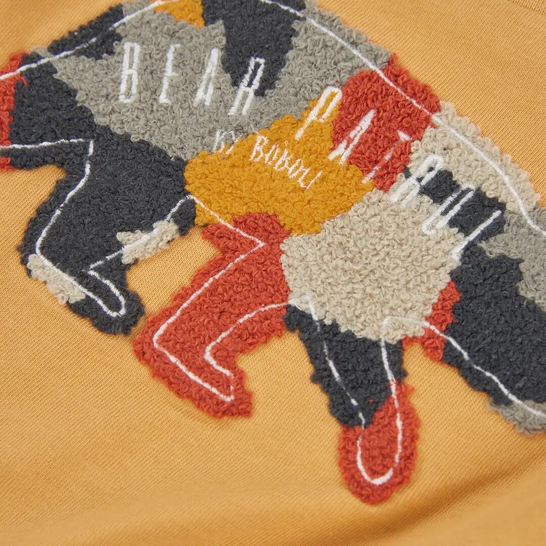 Camiseta punto niño amarilla estampado de oso 3/4