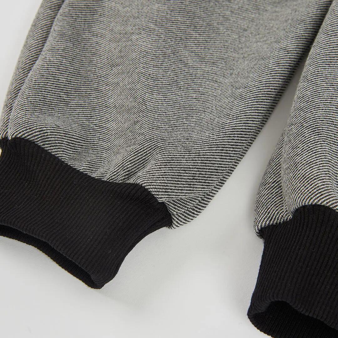 Pantalón punto negro niño con bolsillos cremallera 4/4